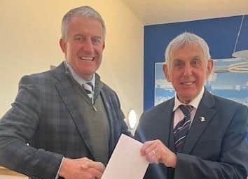Pock 7s supremo Adrian Styche making the draw for the 65th Warrendale Wagyu Pock 7s with Sir Ian McGeechan. Photo by Phil Gilbank
