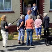 Parishioners queuing to vote in the parish poll at Newby and Scalby Community Hall, Scalby.