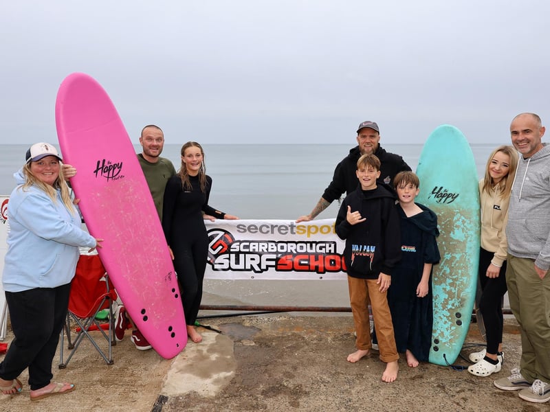 Surfers and Families enjoy the afternoon.
