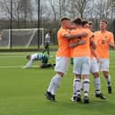 The Edgehill lads celebrate Joe Gallagher's goal in the NRCFA Saturday Challenge Cup win. PHOTO BY ALEC COULSON