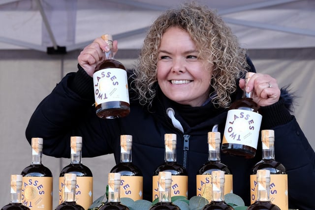 Rebecca Allinson of Two Lasses Spirits selling her produce at the market. 
picture: Richard Ponter