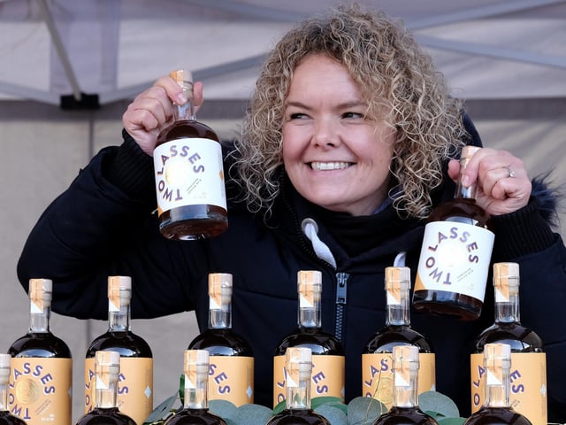 Rebecca Allinson of Two Lasses Spirits selling her produce at the market.
picture: Richard Ponter