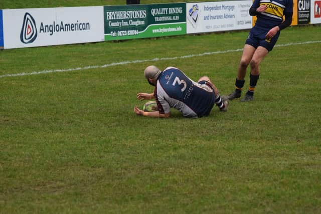 Jake Lyon scores a try in the win at home to Old Crocs.