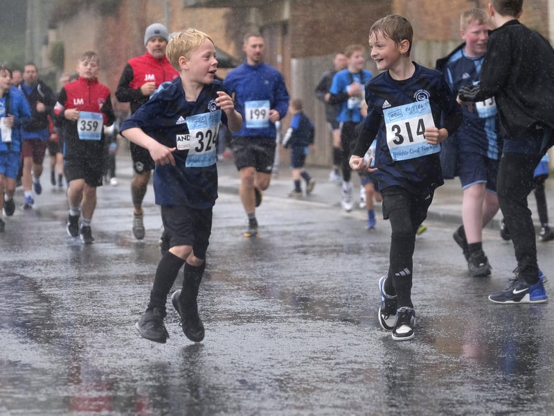 Youngsters having fun, despite the rain.