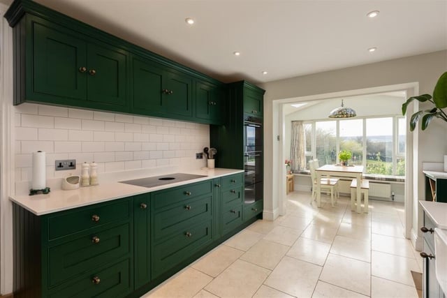 The bespoke kitchen with breakfast room.