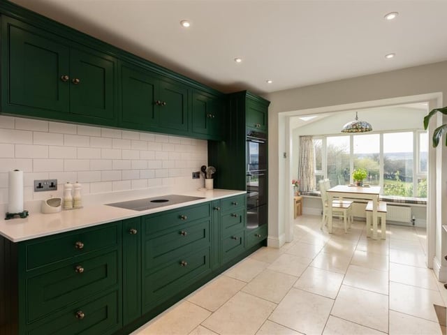 The bespoke kitchen with breakfast room.