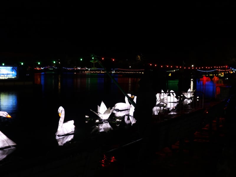 The stunning lanterns bobbing along the lake.