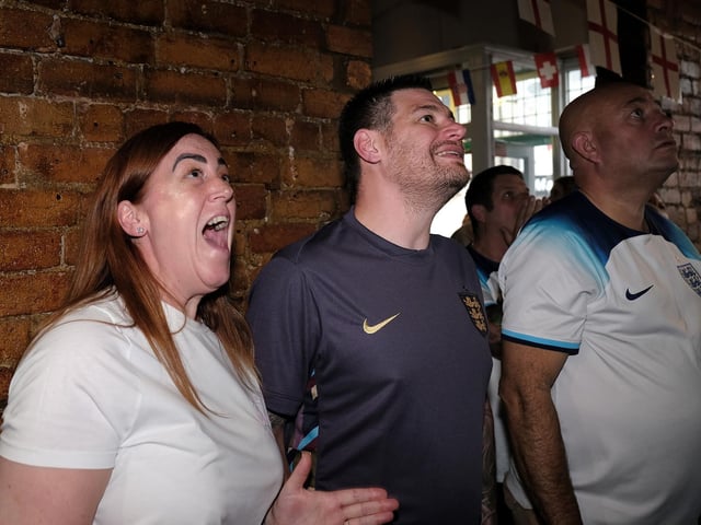 A close call for England as fans watch the game at the J and S Sports Bar.
