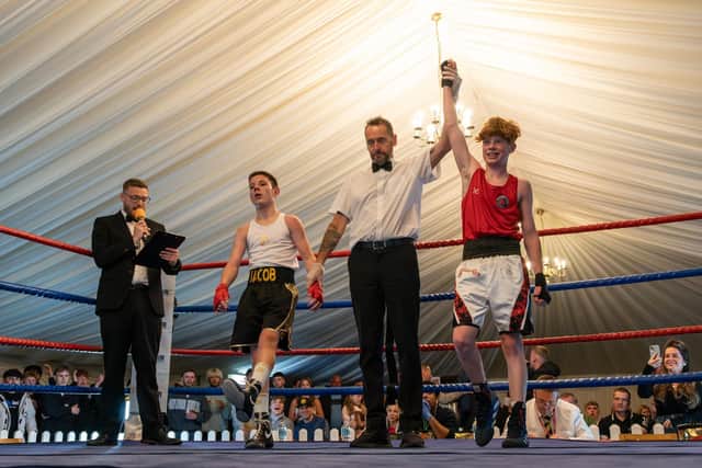 Riley Wilford is named as winner in his fight on the Scarborough ABC show at Scarborough CC. PHOTOS BY WANDERING PHOTOGRAPHY