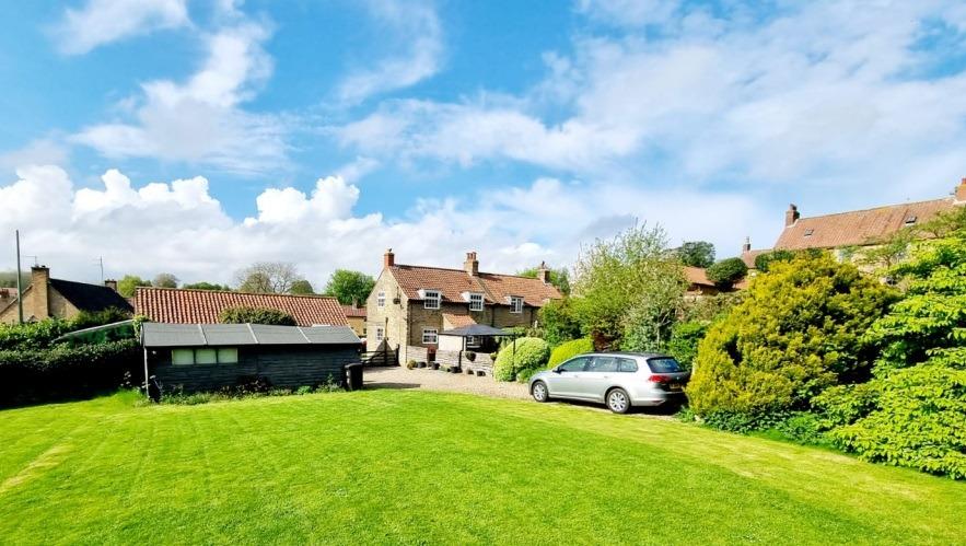 Step inside this carefully updated cottage, with warmth and character throughout Step inside this carefully updated cottage, with warmth and character throughout
