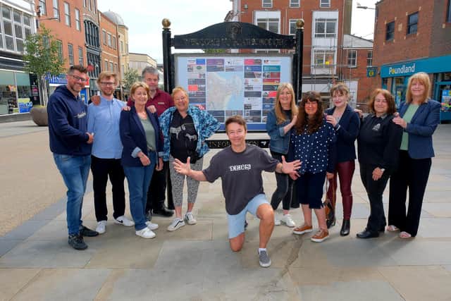 Scarborough Chamber of Trade with local businesses unveil the new information board in the town centre L-R - Alex Anderson, Jack Heaton, Darren Myers, Sarah Thornton, Anita Britton, organiser Chris Golder, Karon Wallis, Janet Jefferson, Kathryn Daye, Penny Peniston and Elaine Stephenson.