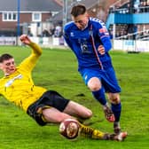 The Belper skipper tries to nick the ball away from Whitby Town's Aaron Haswell.