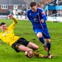 The Belper skipper tries to nick the ball away from Whitby Town's Aaron Haswell.