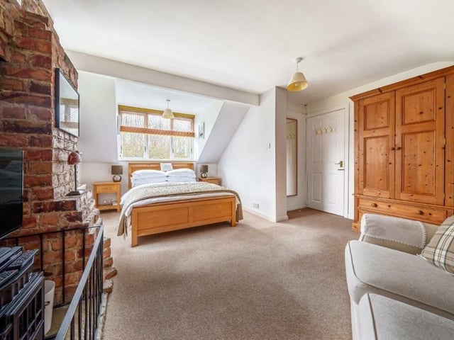 A sizeable double bedroom with character.