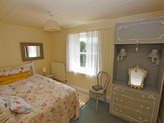 Another light and spacious double bedroom.