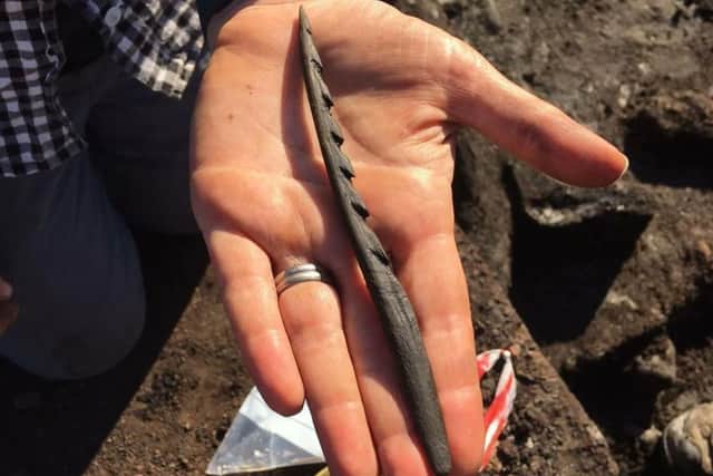 A barbed antler point was also discovered. (Photo: University of Manchester)