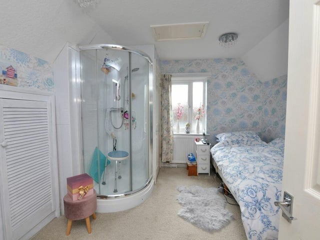 One bedroom within the property has its own shower cubicle.
