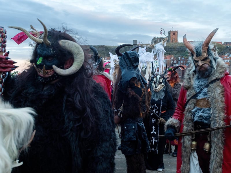 The Krampus Run parade starts from The Bandstand area.