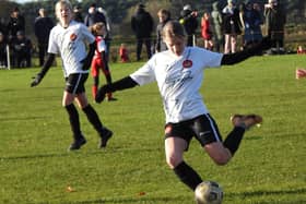 Scarborough Ladies U13s, white kit, take on Scarborough Ladies Lionesses.