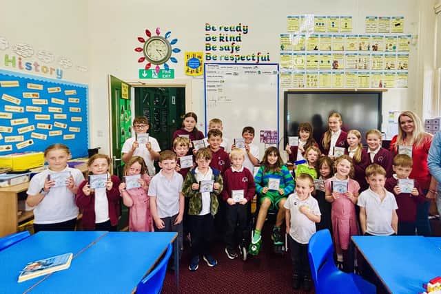 Glaisdale youngsters with their CD cover designs.