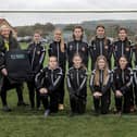 Beyond Housing Community Connector Coordinator Stephanie Lake (left) presents the new Beyond Housing sponsored strip to the Scarborough Ladies U14 team, with their Manager Colin Hepples (right).