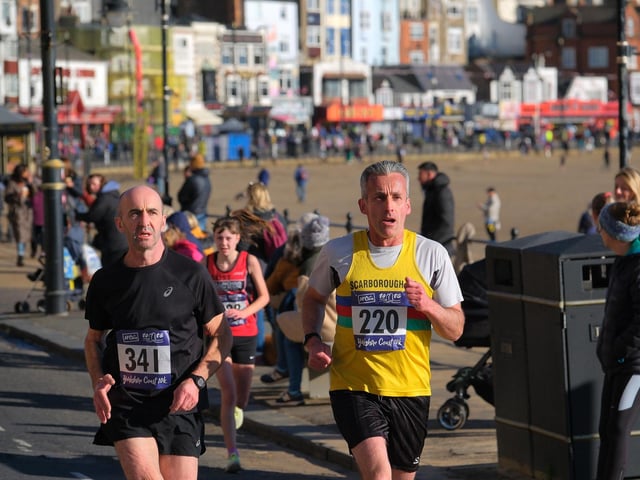 Scarborough AC's Adam Gosling, right, near the end of the 10k. Photo by Richard Ponter