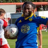Boro defender Kieran Weledji celebrates his equalising goal at Brackley. Photo by Wilkins Photography