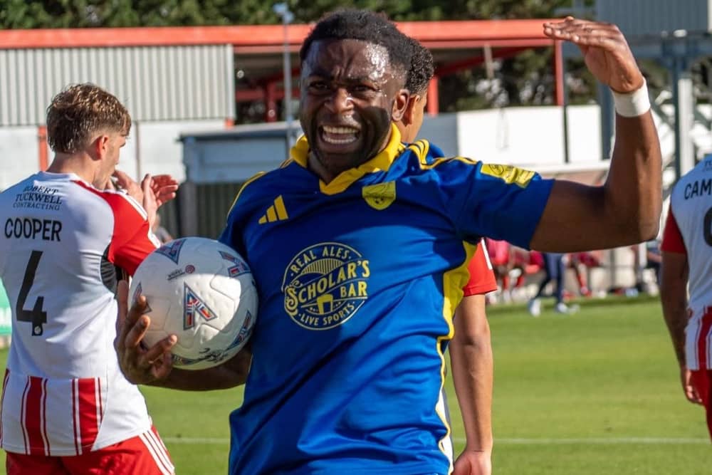 Boro defender Kieran Weledji celebrates his equalising goal at Brackley. Photo by Wilkins Photography