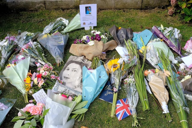 Flower tributes in memory of Her Majesty the Queen may be left in the Town Hall garden