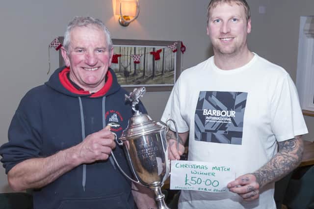 Col Stainthorpe Receives the WSAA Christmas Members Match Trophy and £50 from Neil Eglon. PHOTOS BY PETER HORBURY