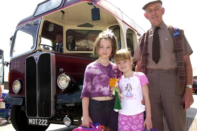 James Elvidge, of Barnby Dun, and his grandchildren Samantha and Victoria Elvidge, aged nine, and seven, prepare to board the old  bus  in 2003