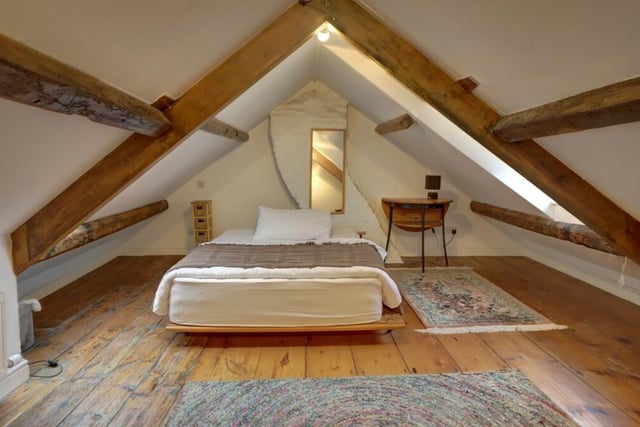 The second floor bedroom has great character, and looks out over extensive countryside.