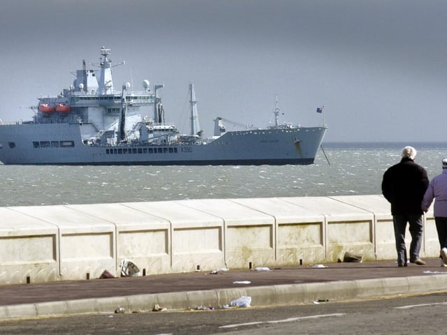 HM Wave Ruler, Scarborough's adopted ship, moors offshore. 061322c