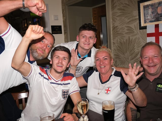 Cheering for England in The Dickens bar