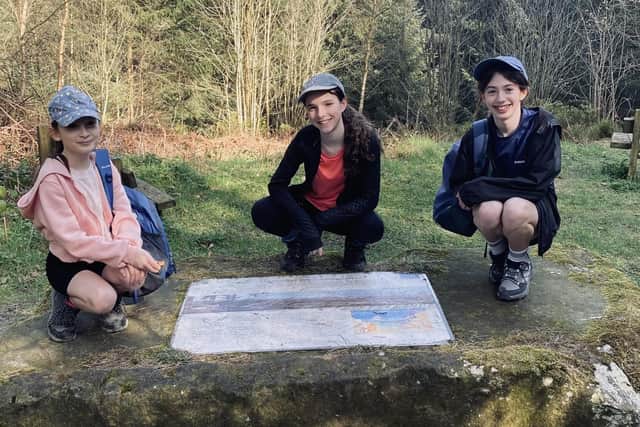 Florence, Penny and Alice, pupils at Wykeham CE Primary School, on their 14-mile sponsored walk.