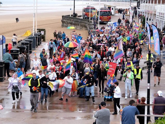 Bridlington Pride parade marches along the Promenade.