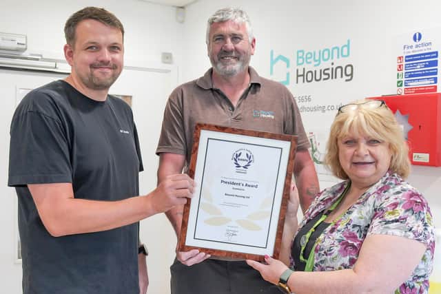 Beyond Housing Health & Safety Team members (from left) Andy Roebuck, Eric Chatt and Karen Stubbs pictured with the RoSPA President's Award certificate.
