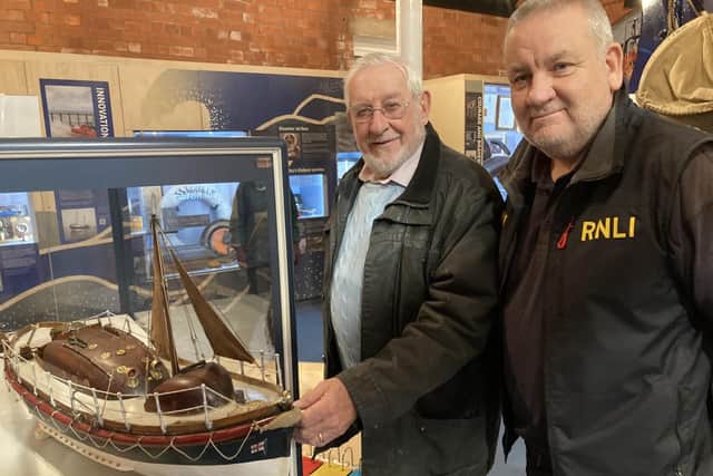 Former Whitby RNLI coxswain and restorer of the model, Pete Thomson, with current coxswain Howard Fields
picture: RNLI