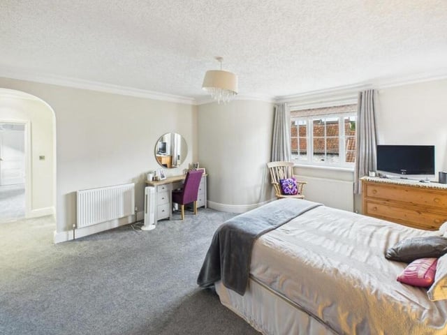 One of the property's five spacious bedrooms.