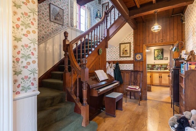The hallway with original staircase.