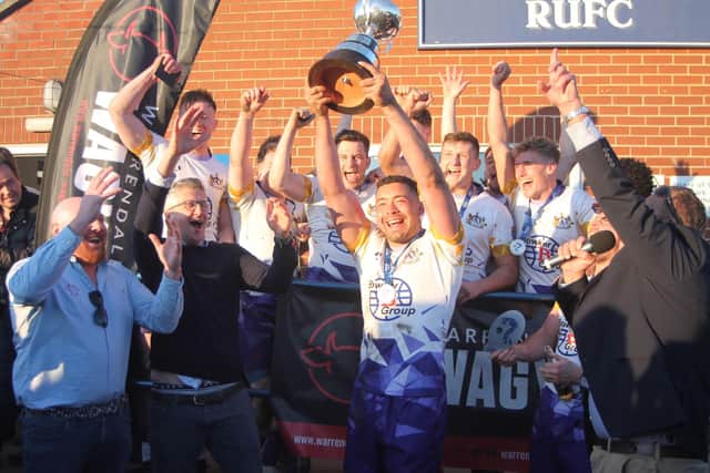 Cleveland Cougars celebrate after receiving the WS Fowler Challenge Trophy from Warrendale Wagyu director Tom Richardson. PHOTO BY PHIL GILBANK