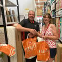 Argos store manager Jono Paulson presenting the food donation to Mel Tilley, one of Foodbank4Whitby trustees.