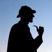 Silhouette of Sherlock Holmes's statue in London near Baker Street. Photo: Getty Images