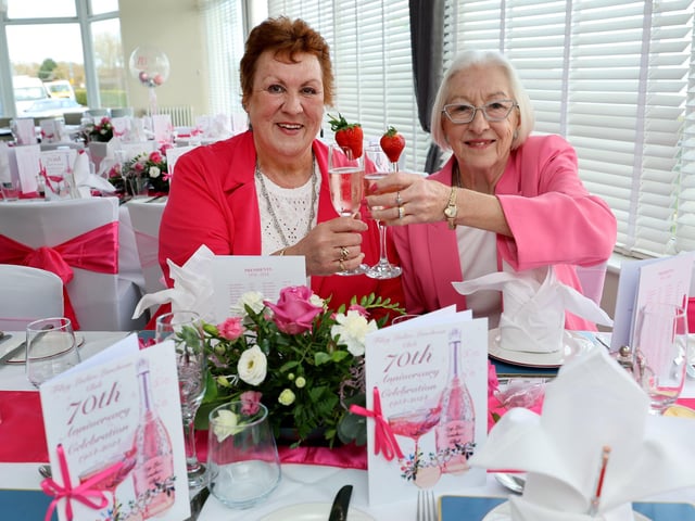 Deputy Mayor Linda Randall and President Elizabeth Gilmour making a toast