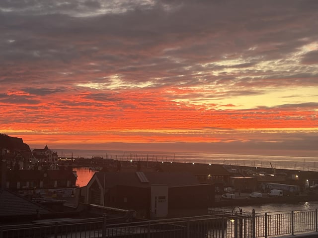 Another fiery sky at Scarborough, by Mick Bayes.