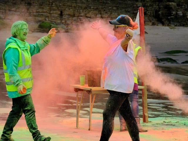 Crossing the finish line, colour run-style.