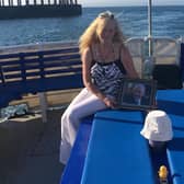 Derek Rose's ashes were scattered at sea - he always wore a hat and the white one was his summer one.