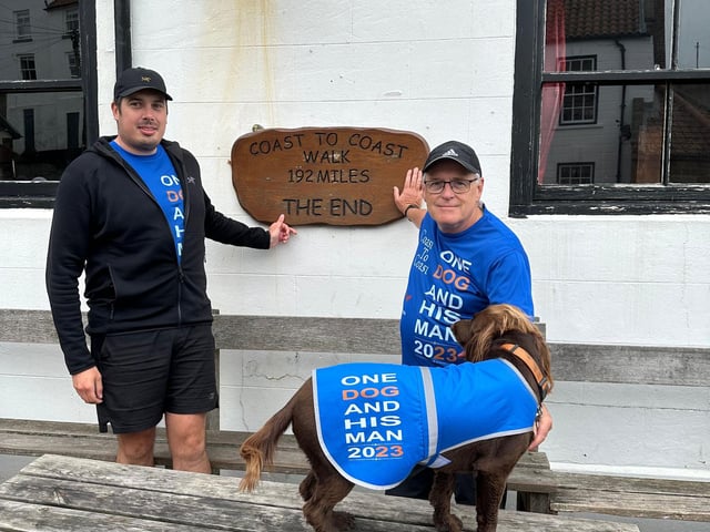 Ken at the end of his coast to coast walk with his stepson Mark and loving companion Paddy the dog.