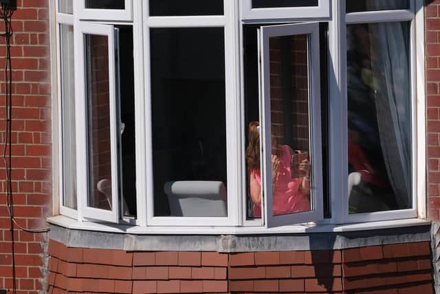Bridlington residents were even watching the race from their windows as the bikes sped past. Photo: Richard Ponter