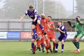 Brid Spa rise highest for a header in the ER League Junior Cup final win against Springhead. PHOTOS BY TCF PHOTOGRAPHY
